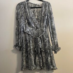 Size medium, snake skin, belted, long sleeve dress.